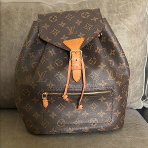 Louis Vuitton Monogram Canvas Drawstring Backpack in Brown and Tan